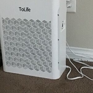 Digital Electric air purifier w/ re-placeible air filter.